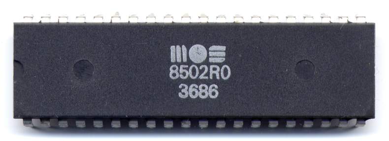 Image of MOS 8502 CPU: a 40-pin, dual in-line, ceramic chip